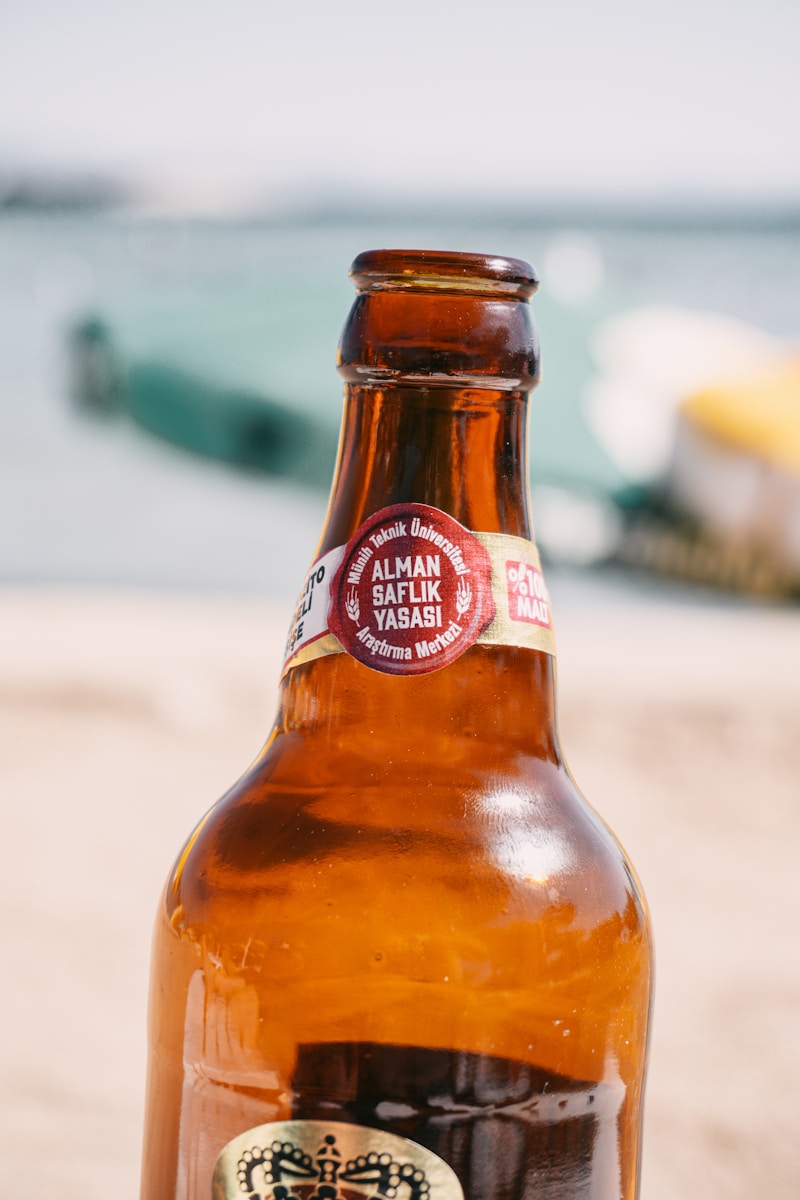 A close up of a bottle of beer on a table
