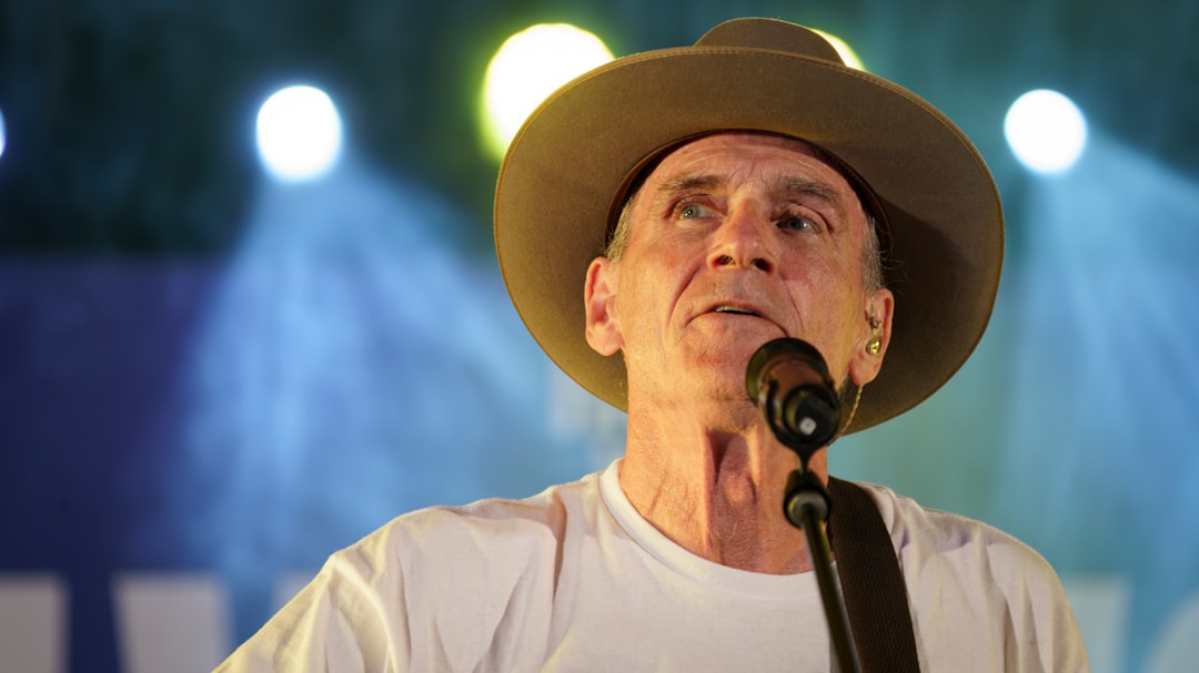 Singer/songwriter James Taylor performs at a Kamala Harris campaign rally in Wilmington, NC, USA.